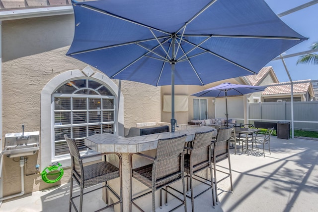1833 Barnstable Rd, Wellington, FL 33414 - view of patio with a bar