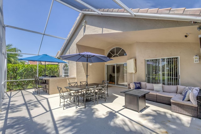 1833 Barnstable Rd, Wellington, FL 33414 - view of patio with an outdoor living space and glass enclosure