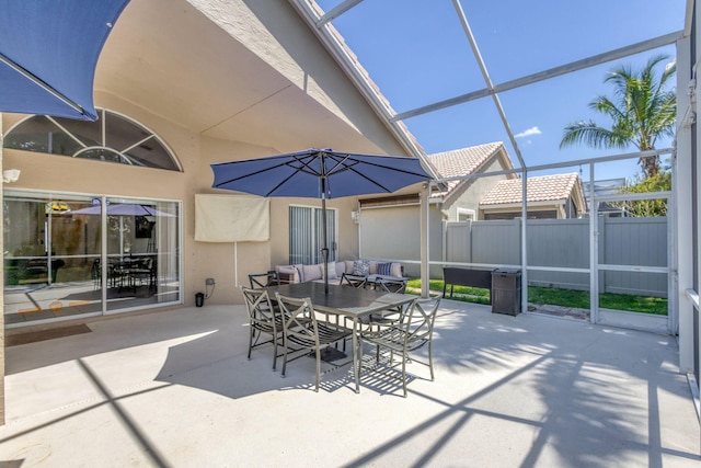 1833 Barnstable Rd, Wellington, FL 33414 - view of patio with glass enclosure and outdoor dining area