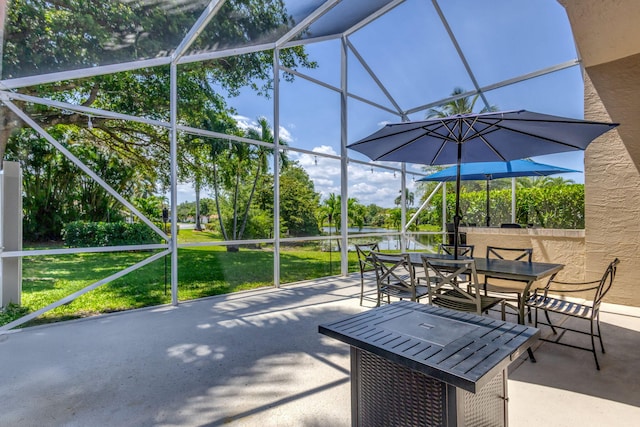 1833 Barnstable Rd, Wellington, FL 33414 - view of patio / terrace featuring a lanai, a water view, and outdoor dining area