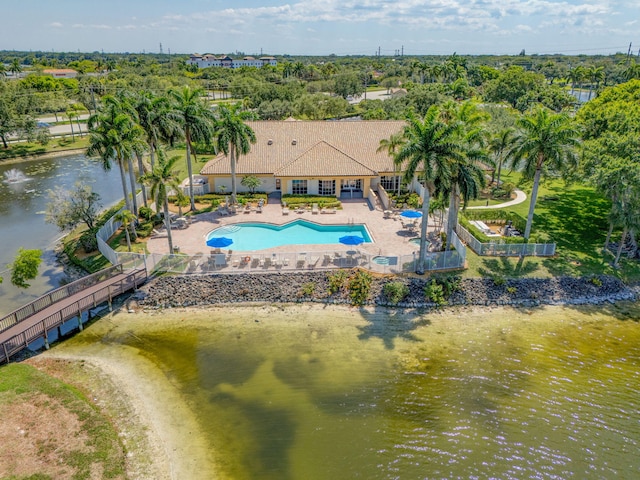 1833 Barnstable Rd, Wellington, FL 33414 - view of subject property featuring a pool, a tree filled landscape, and a large body of water