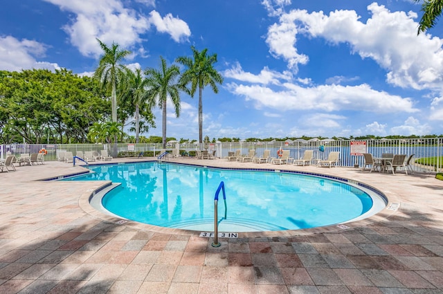 1833 Barnstable Rd, Wellington, FL 33414 - community pool featuring a patio area