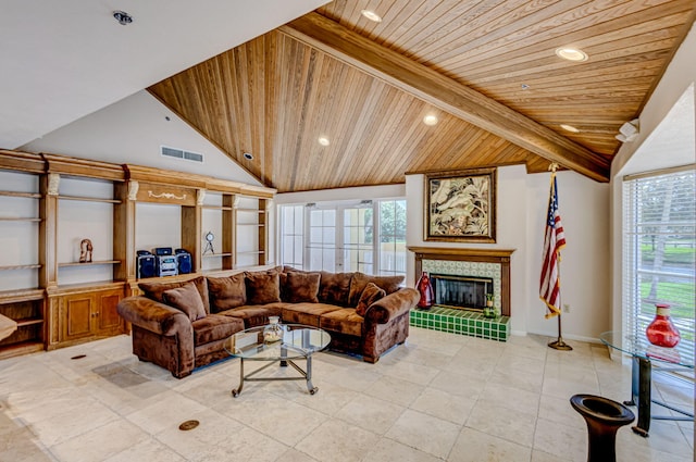 1833 Barnstable Rd, Wellington, FL 33414 - living area featuring wood ceiling, plenty of natural light, a fireplace, and recessed lighting