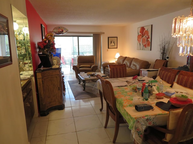 9233 SW 8th St Unit 207, Boca Raton, FL 33428 - dining space with a chandelier