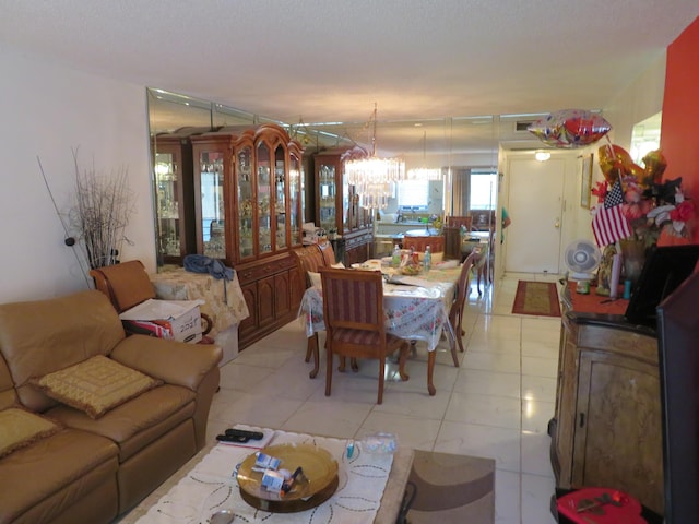 9233 SW 8th St Unit 207, Boca Raton, FL 33428 - dining space featuring a chandelier