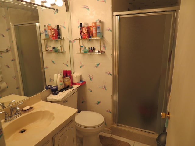 9233 SW 8th St Unit 207, Boca Raton, FL 33428 - full bathroom with a shower stall, tile patterned flooring, toilet, and vanity