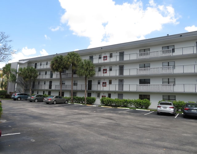 9233 SW 8th St Unit 207, Boca Raton, FL 33428 - view of apartment building / complex with uncovered parking