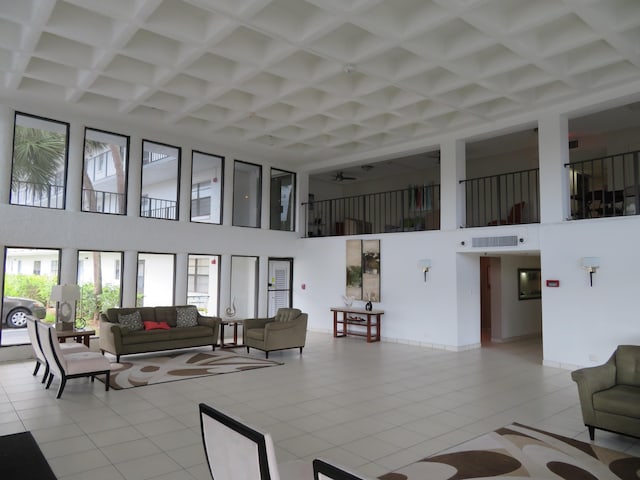 9233 SW 8th St Unit 207, Boca Raton, FL 33428 - community lobby featuring a towering ceiling, coffered ceiling, and beam ceiling