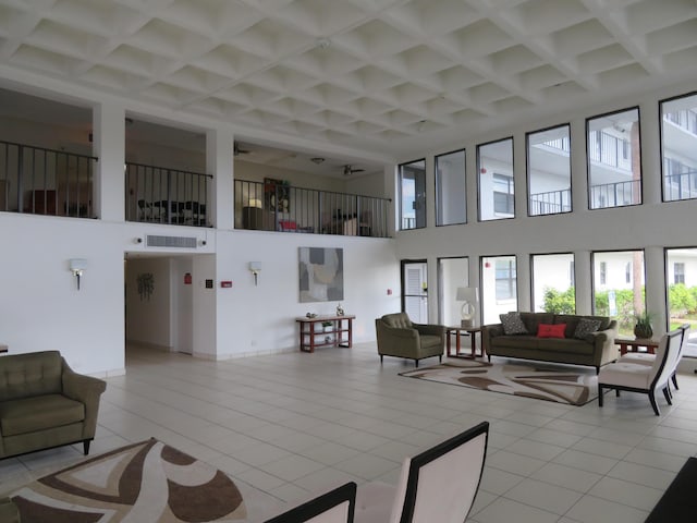 9233 SW 8th St Unit 207, Boca Raton, FL 33428 - common area with coffered ceiling, a towering ceiling, and beam ceiling