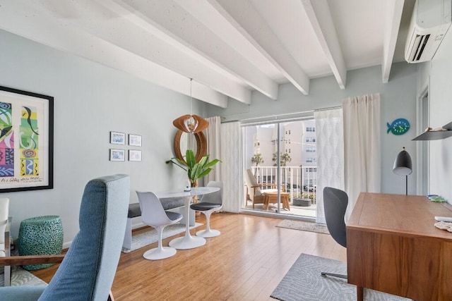 3500 S Ocean Blvd Unit 308, South Palm Beach, FL 33480 - office featuring a wall unit AC, beam ceiling, and wood finished floors