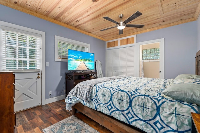 2560 50th Ave, Vero Beach, FL 32966 - bedroom with crown molding, wood ceiling, wood finished floors, multiple windows, and baseboards