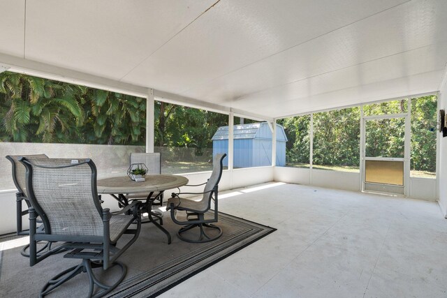 2560 50th Ave, Vero Beach, FL 32966 - sunroom featuring outdoor dining area and healthy amount of natural light