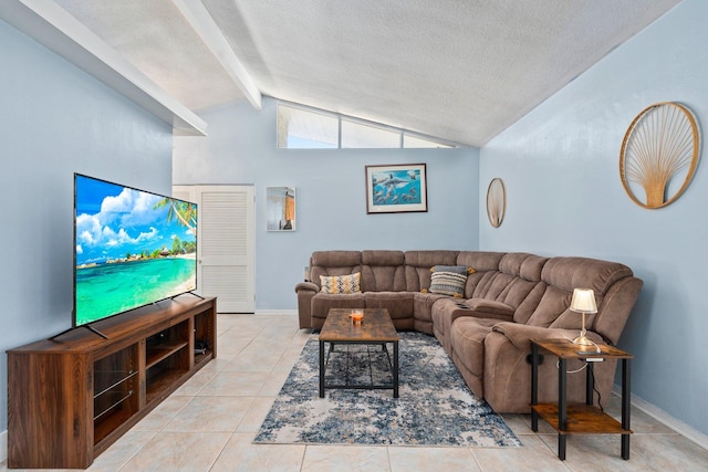 2560 50th Ave, Vero Beach, FL 32966 - living area featuring tile patterned floors, a textured ceiling, and baseboards