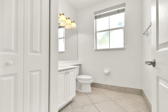 1246 Via De Fossi, Boynton Beach, FL 33426 - bathroom with vanity, toilet, tile patterned floors, and baseboards