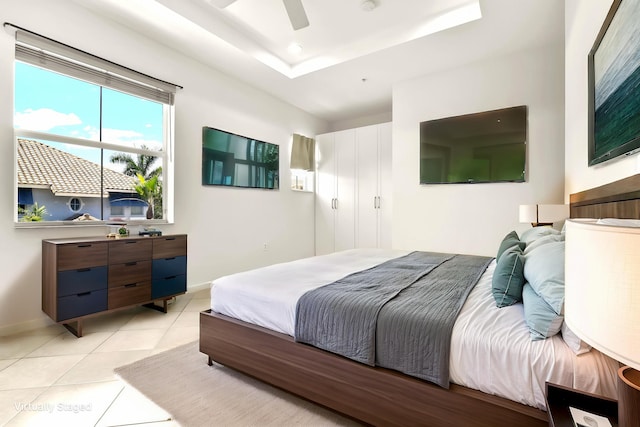 1246 Via De Fossi, Boynton Beach, FL 33426 - bedroom featuring light tile patterned floors, a ceiling fan, recessed lighting, a tray ceiling, and baseboards