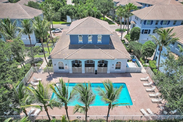 1246 Via De Fossi, Boynton Beach, FL 33426 - back of property featuring a tile roof, stucco siding, a fenced backyard, and a patio