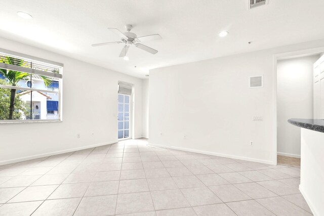 1246 Via De Fossi, Boynton Beach, FL 33426 - empty room with a ceiling fan, recessed lighting, baseboards, and light tile patterned floors