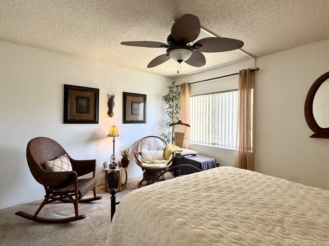 1560 NE 12th Ter Unit D9, Jensen Beach, FL 34957 - carpeted bedroom with a ceiling fan and a textured ceiling