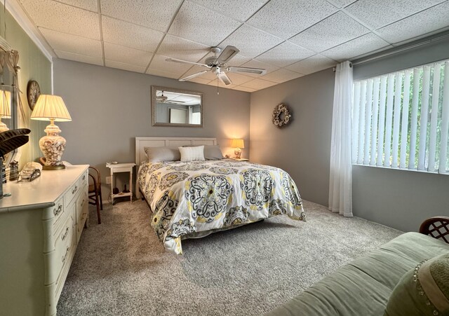 1560 NE 12th Ter Unit D9, Jensen Beach, FL 34957 - bedroom with carpet, a drop ceiling, and a ceiling fan