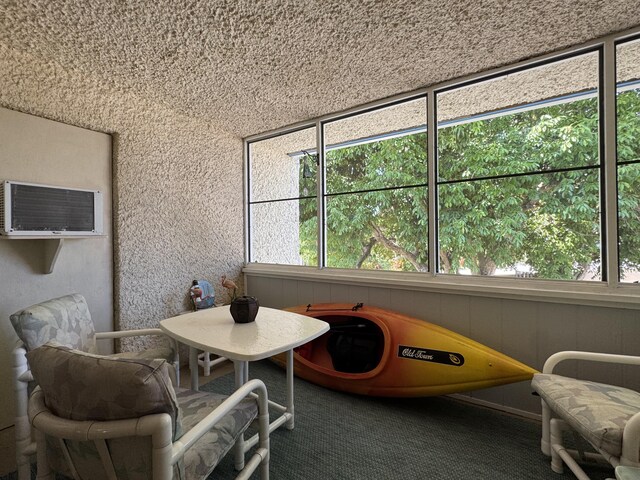 1560 NE 12th Ter Unit D9, Jensen Beach, FL 34957 - sunroom featuring an AC wall unit