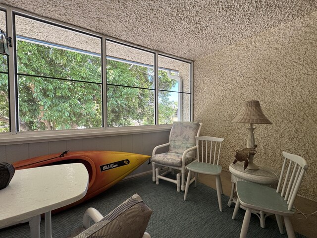 1560 NE 12th Ter Unit D9, Jensen Beach, FL 34957 - living area featuring carpet flooring