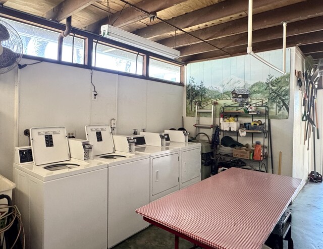 1560 NE 12th Ter Unit D9, Jensen Beach, FL 34957 - community laundry featuring separate washer and dryer