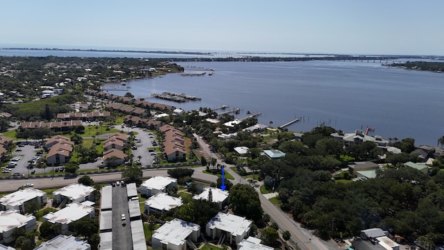 1560 NE 12th Ter Unit D9, Jensen Beach, FL 34957 - aerial overview of property's location with a large body of water and nearby suburban area