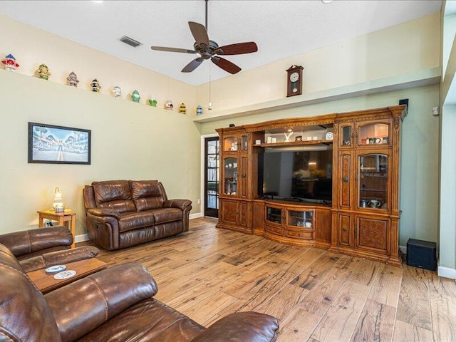 6575 NW Pomona Ct, Port Saint Lucie, FL 34983 - living area with light wood-style floors and ceiling fan
