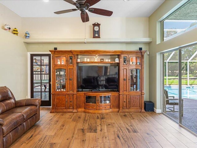 6575 NW Pomona Ct, Port Saint Lucie, FL 34983 - living room with a ceiling fan and hardwood / wood-style floors