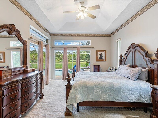 6575 NW Pomona Ct, Port Saint Lucie, FL 34983 - bedroom with light colored carpet, access to outside, a tray ceiling, and ceiling fan
