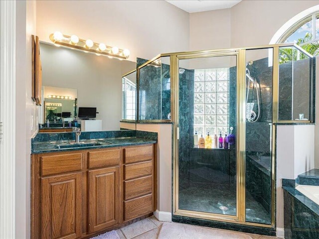 6575 NW Pomona Ct, Port Saint Lucie, FL 34983 - bathroom with vanity, a stall shower, a bath, and tile patterned floors