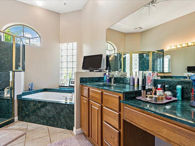 6575 NW Pomona Ct, Port Saint Lucie, FL 34983 - full bath with a bath, a shower stall, vanity, and tile patterned floors