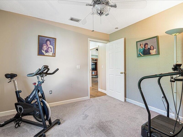 6575 NW Pomona Ct, Port Saint Lucie, FL 34983 - exercise area featuring ceiling fan and carpet floors