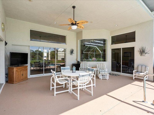 6575 NW Pomona Ct, Port Saint Lucie, FL 34983 - view of patio with ceiling fan and outdoor dining space