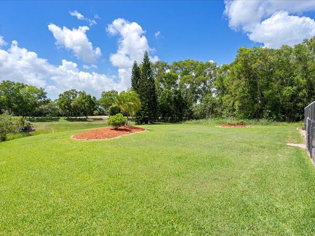 6575 NW Pomona Ct, Port Saint Lucie, FL 34983 - view of green lawn