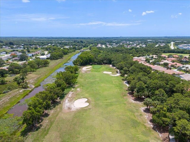 6575 NW Pomona Ct, Port Saint Lucie, FL 34983 - aerial view of a nearby body of water and a tree filled landscape