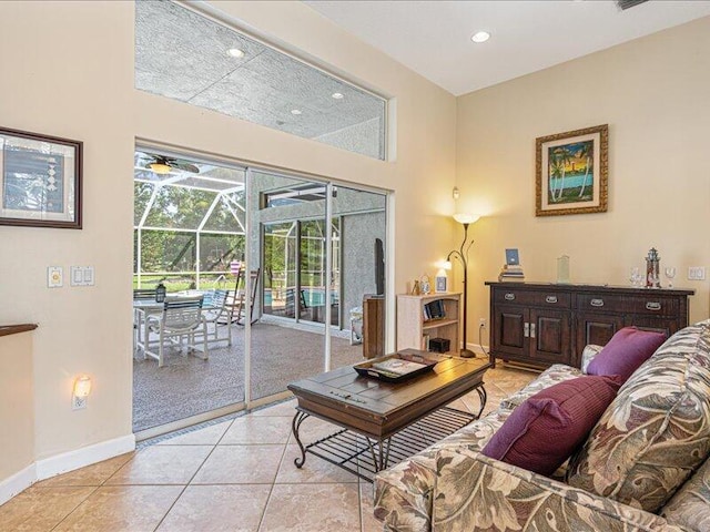 6575 NW Pomona Ct, Port Saint Lucie, FL 34983 - living area with a sunroom, light tile patterned floors, recessed lighting, and a ceiling fan