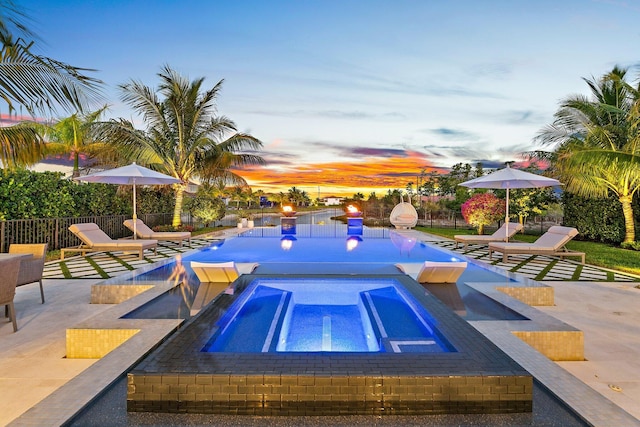 122 Cerulean Key Way, Jupiter, FL 33478 - view of pool with an in-ground hot tub and a patio area