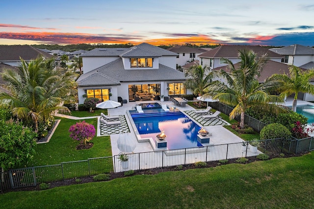 122 Cerulean Key Way, Jupiter, FL 33478 - back of house featuring an outdoor living space, stucco siding, a patio area, and a residential view