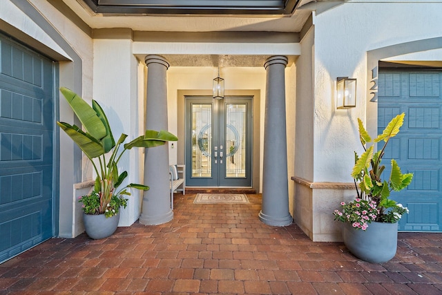 122 Cerulean Key Way, Jupiter, FL 33478 - doorway to property with french doors and stucco siding