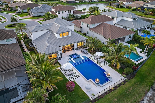 122 Cerulean Key Way, Jupiter, FL 33478 - aerial perspective of suburban area featuring a pool area and a nearby body of water