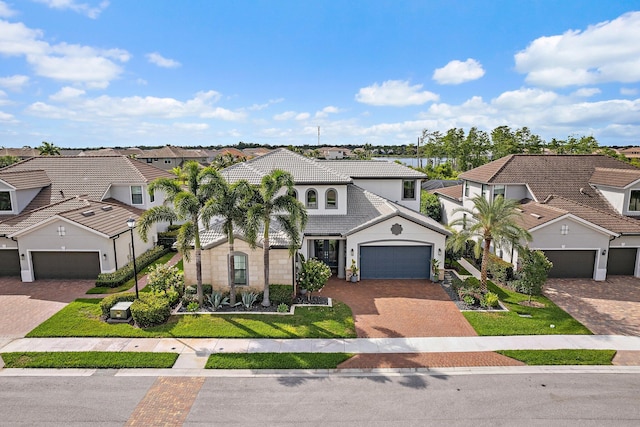122 Cerulean Key Way, Jupiter, FL 33478 - view of front of property featuring a residential view, a tile roof, and decorative driveway