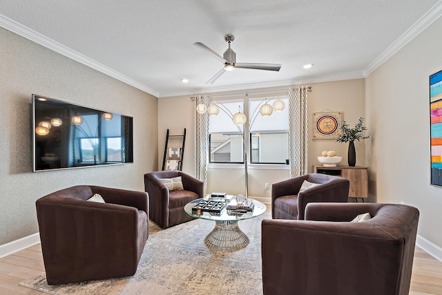 122 Cerulean Key Way, Jupiter, FL 33478 - living room featuring crown molding, wood finished floors, a ceiling fan, baseboards, and a textured ceiling