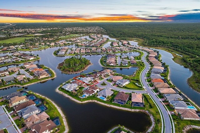 122 Cerulean Key Way, Jupiter, FL 33478 - aerial view of property and surrounding area featuring nearby suburban area, a nearby body of water, and a forest