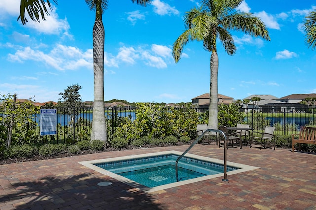 122 Cerulean Key Way, Jupiter, FL 33478 - view of swimming pool with a hot tub, a patio, a water view, and a swimming pool