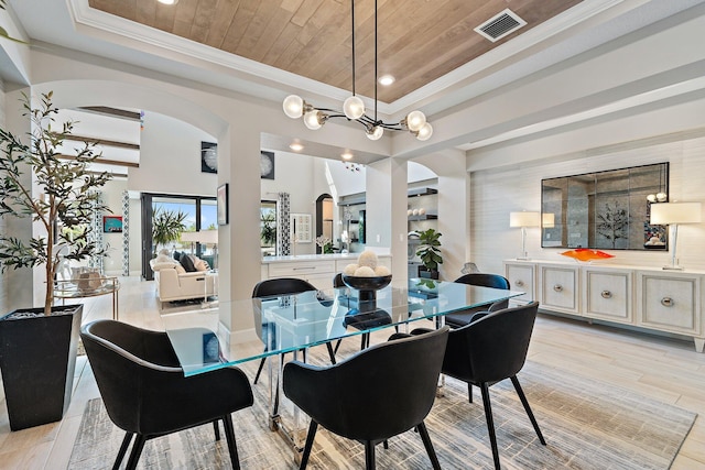 122 Cerulean Key Way, Jupiter, FL 33478 - dining space featuring arched walkways, ornamental molding, a raised ceiling, recessed lighting, and wooden ceiling