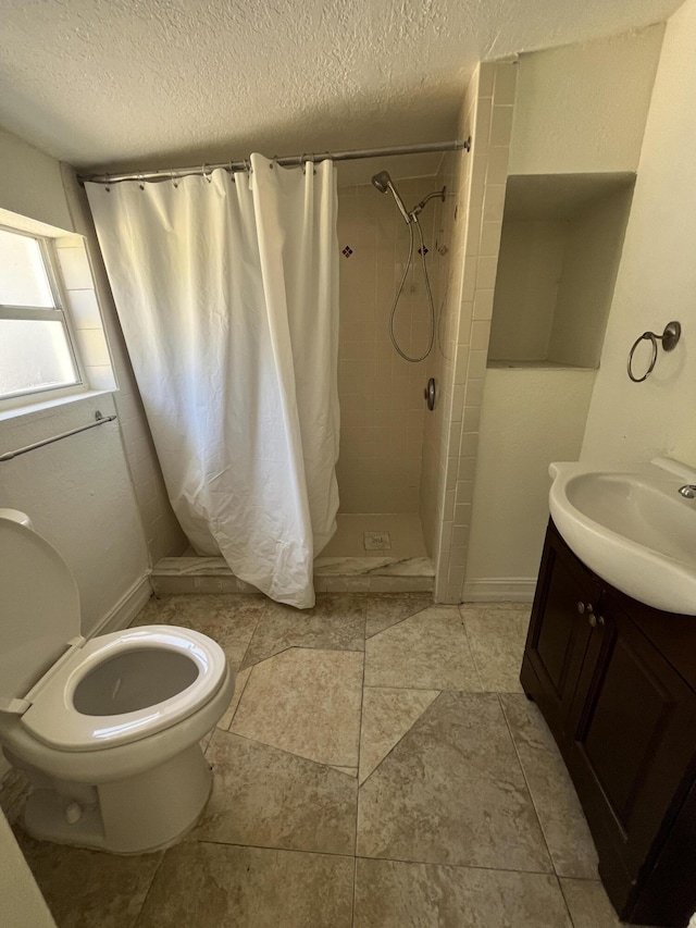 711 Fernwood Dr, West Palm Beach, FL 33405 - bathroom featuring a textured ceiling, a shower stall, toilet, baseboards, and vanity