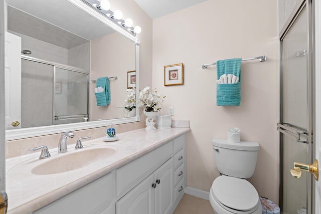 201 Bayview Ave Unit D, Boynton Beach, FL 33435 - full bathroom featuring toilet, vanity, tiled shower, and tile patterned flooring