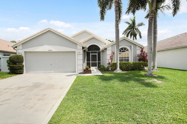1644 Oak Berry Cir, Wellington, FL 33414 - ranch-style house featuring a garage, a front yard, concrete driveway, and stucco siding