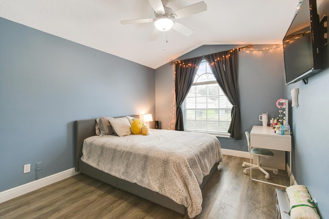 1644 Oak Berry Cir, Wellington, FL 33414 - bedroom with vaulted ceiling, wood finished floors, baseboards, and a ceiling fan